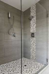MSI Black and White Tumbled Pebble shower pic Quality Floors & More Pompano Beach