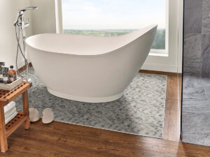 MSI Puebla Greige Pebble mosaic tub pic Quality Floors & More Pompano Beach